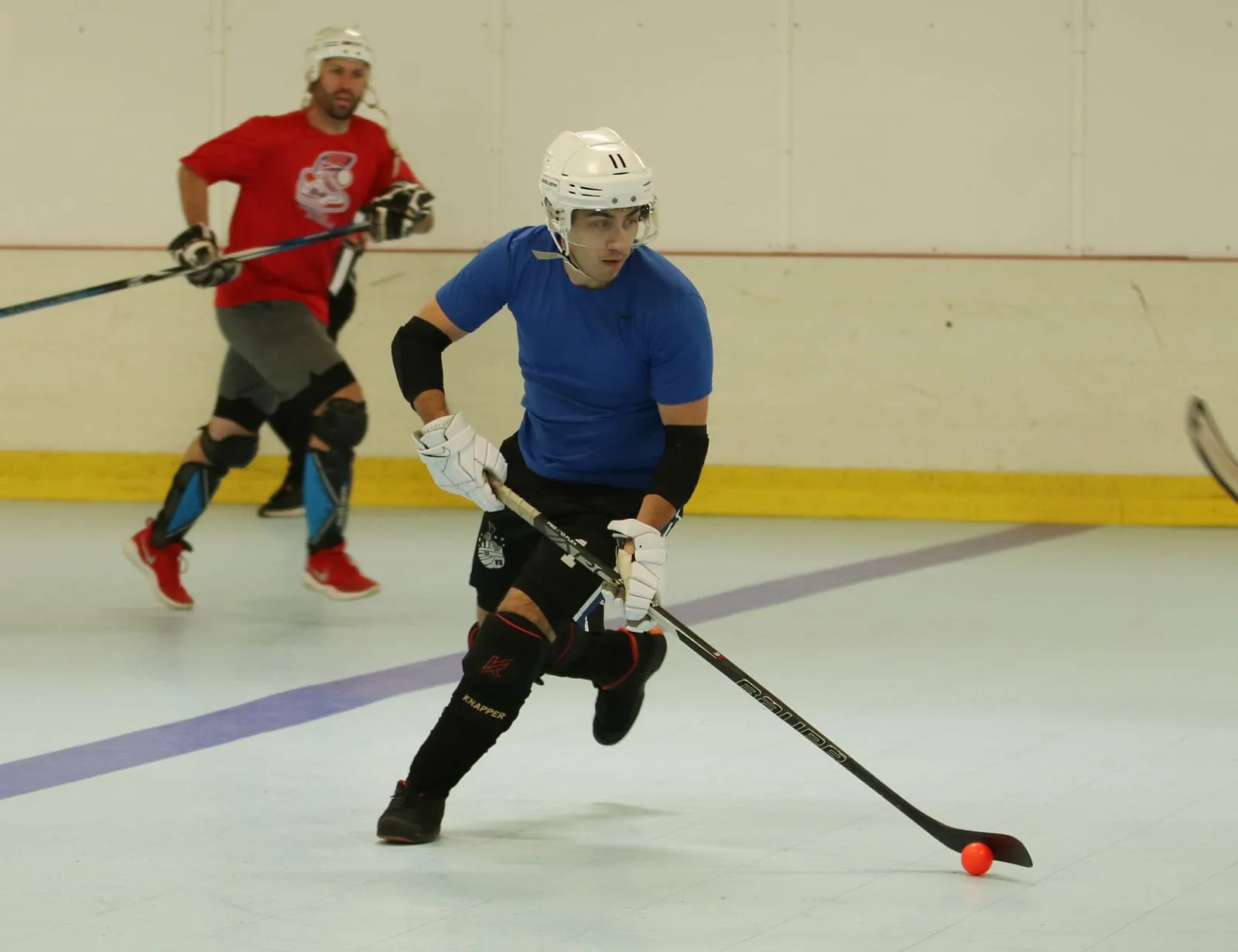 Mark Szymanski playing ball hockey